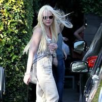 Lindsay Lohan showing off her styled hair as she leaves Byron n Tracey salon | Picture 68953